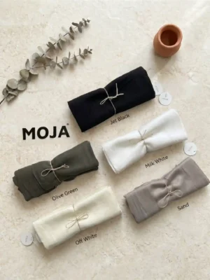 Lightweight modal hijab by Moja, five rolled scarves tied with twine